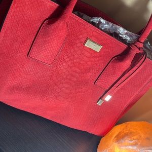 Red suede Kate Spade hand bag